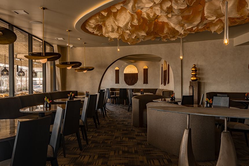 Newly designed restaurant dining room with sculpted ceiling